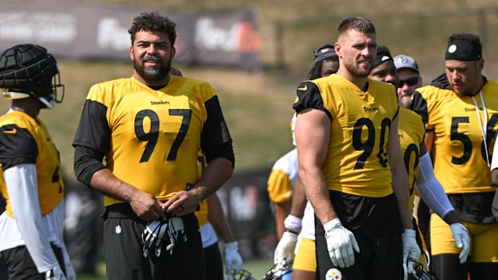 Jul 28, 2024; Latrobe, PA, USA; Pittsburgh Steelers defensive tackle Cameron Heyward (97) and linebacker T.J. Watt (90) participate in drills during training camp at Saint Vincent College. Mandatory Credit: Barry Reeger-Imagn Images