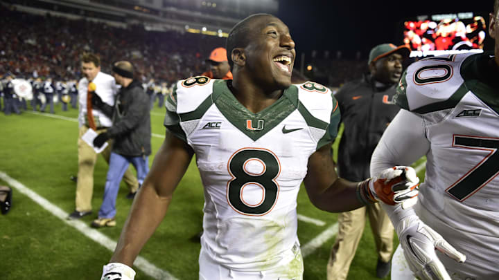 Oct 23, 2014; Blacksburg, VA, USA; Miami Hurricanes running back Duke Johnson (8) runs off the field at halftime at Lane Stadium. Mandatory Credit: Bob Donnan-Imagn Images