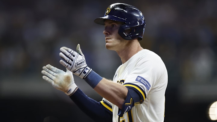 Oct 4, 2023; Milwaukee, Wisconsin, USA; Milwaukee Brewers player Mark Canha (21) reacts after hitting a single in the eighth inning against the Arizona Diamondbacks during game two of the Wildcard series for the 2023 MLB playoffs at American Family Field.