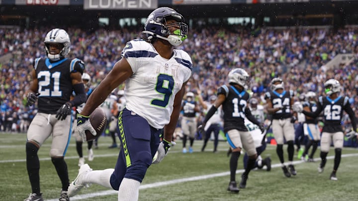 Sep 24, 2023; Seattle, Washington, USA; Seattle Seahawks running back Kenneth Walker III (9) celebrates after rushing for a touchdown against the Carolina Panthers during the fourth quarter at Lumen Field.