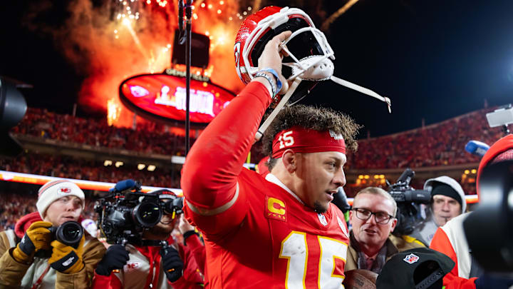 Jan 26, 2025; Kansas City, MO, USA; Kansas City Chiefs quarterback Patrick Mahomes (15) reacts as he takes off his helmet after defeating the Buffalo Bills during the AFC Championship game at GEHA Field at Arrowhead Stadium. Mandatory Credit: Mark J. Rebilas-Imagn Images