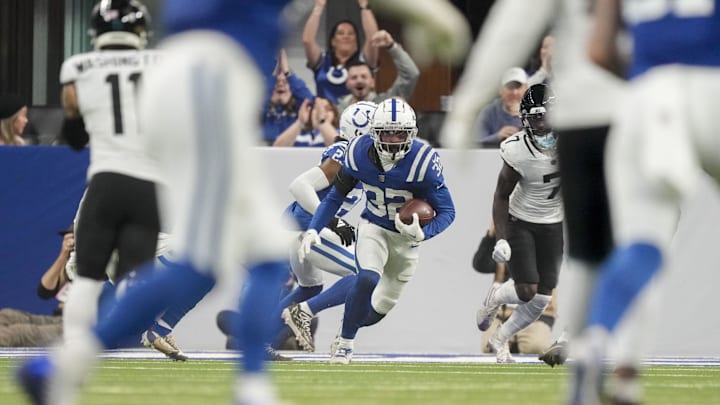 Jan 5, 2025; Indianapolis, Indiana, USA; Indianapolis Colts safety Julian Blackmon (32) turns to run after intercepting a pass during a game against the Jacksonville Jaguars at Lucas Oil Stadium. Mandatory Credit: Grace Hollars/USA TODAY Network via Imagn Images