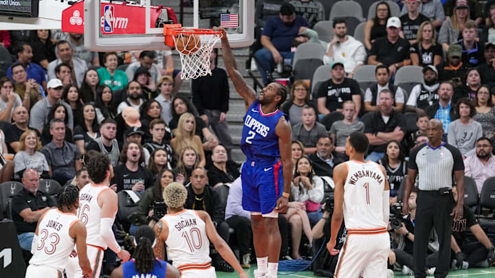   LA Clippers forward Kawhi Leonard (2) dunks in the first half against the San Antonio Spurs at the Frost Bank Center. Mandatory Credit: Daniel Dunn-Imagn Images