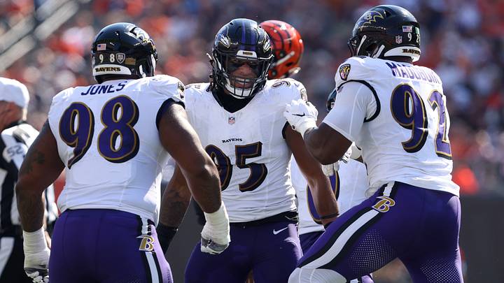 Oct 6, 2024; Cincinnati, Ohio, USA; Baltimore Ravens linebacker Tavius Robinson (95) celebrates a sack during the first half against the Cincinnati Bengals at Paycor Stadium. Mandatory Credit: Joseph Maiorana-Imagn Images Oct 6, 2024; Cincinnati, Ohio, USA; Baltimore Ravens linebacker Tavius Robinson (95) celebrates a sack during the first half against the Cincinnati Bengals at Paycor Stadium. Mandatory Credit: Joseph Maiorana-Imagn Images