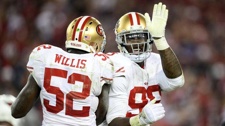 Oct. 29, 2012; Glendale, AZ, USA; San Francisco 49ers linebacker (99) Aldon Smith celebrates a sack with linebacker (52) Patrick Willis in the second half against the Arizona Cardinals at University of Phoenix Stadium. The 49ers defeated the Cardinals 24-3. Mandatory Credit: Mark J. Rebilas-Imagn Images
