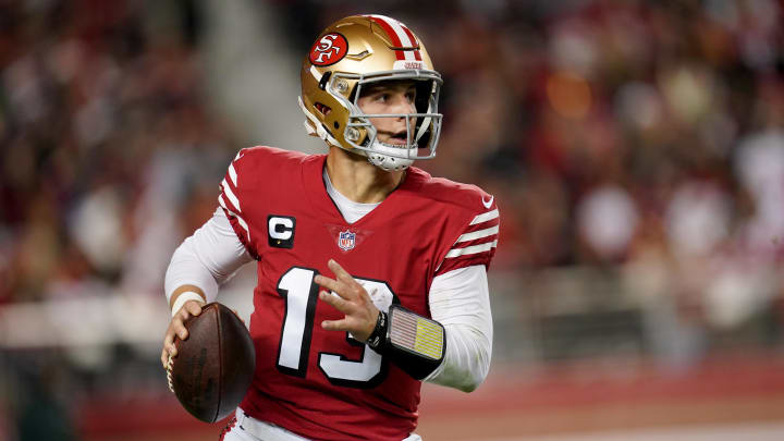 Dec 25, 2023; Santa Clara, California, USA; San Francisco 49ers quarterback Brock Purdy (13) runs the ball against the Baltimore Ravens in the fourth quarter at Levi's Stadium. Mandatory Credit: Cary Edmondson-USA TODAY Sports Dec 25, 2023; Santa Clara, California, USA; San Francisco 49ers quarterback Brock Purdy (13) runs the ball against the Baltimore Ravens in the fourth quarter at Levi's Stadium. Mandatory Credit: Cary Edmondson-USA TODAY Sports