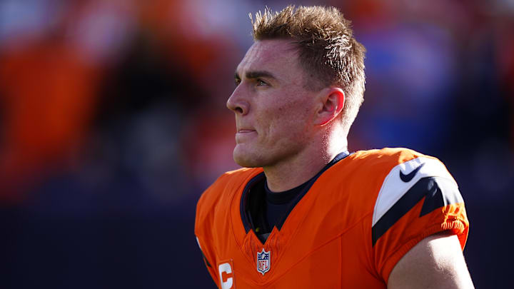 Dec 14, 2025: Denver Broncos quarterback Bo Nix (10) warms up before a game against the Green Bay Packers at Empower Field at Mile High. 