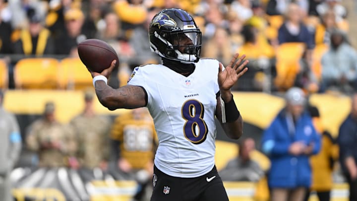 Nov 17, 2024; Pittsburgh, Pennsylvania, USA; Baltimore Ravens quarterback Lamar Jackson (8) throws a pass against the Pittsburgh Steelers during the second quarter at Acrisure Stadium. Mandatory Credit: Barry Reeger-Imagn Images