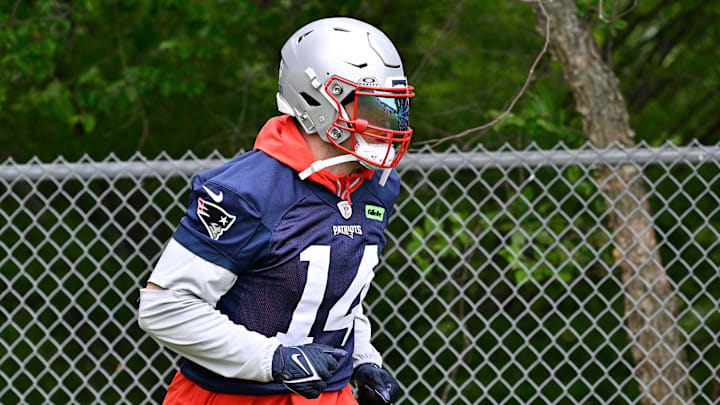Jun 9, 2025; Foxborough, MA, USA; New England Patriots linebacker Robert Spillane (14) walks to the practice fields at Gillette Stadium. Mandatory Credit: Eric Canha-Imagn Images