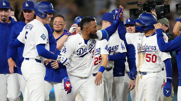 Sep 3, 2026; Los Angeles, California, USA; Los Angeles Dodgers left fielder Teoscar Hernandez (37) celebrates with first baseman Freddie Freeman (5) and shortstop Mookie Betts (50) after hitting a walk-off double against the St. Louis Cardinals at Dodger Stadium. Mandatory Credit: Kirby Lee-Imagn Images