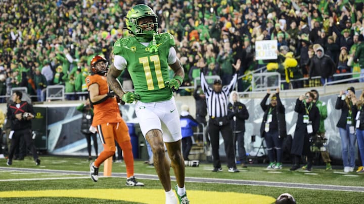 Nov 24, 2023; Eugene, Oregon, USA; Oregon Ducks wide receiver Troy Franklin (11) celebrates after catching a pass for a touchdown during the first half against the Oregon State Beavers at Autzen Stadium. Mandatory Credit: Troy Wayrynen-USA TODAY Sports