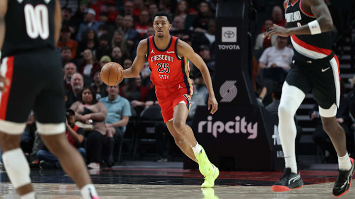 Apr 9, 2024; Portland, Oregon, USA;  New Orleans Pelicans guard Trey Murphy III (25) brings the ball up the court Portland Trail Blazers in the first half at Moda Center.