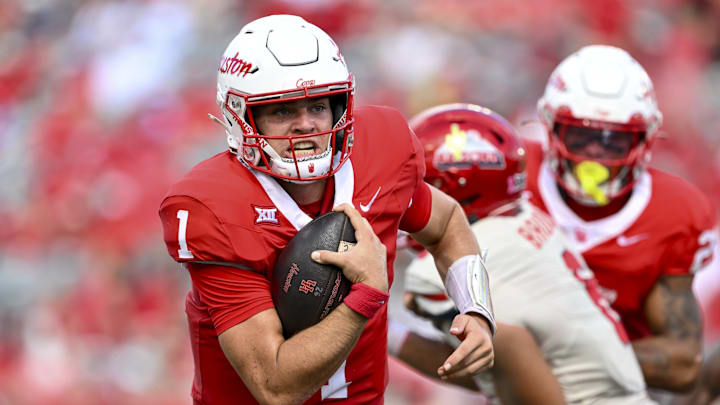 Oct 18, 2025; Houston, Texas, USA; Houston Cougars quarterback Conner Weigman (1) runs the ball into the end zone for a touchdown during the second quarter against the Arizona Wildcats at TDECU Stadium. Mandatory Credit: Maria Lysaker-Imagn Images 