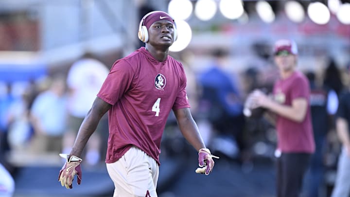 Sep 28, 2024; Dallas, Texas, USA; Florida State Seminoles defensive back Charles Lester III (4) before the game between the Southern Methodist Mustangs and the Florida State Seminoles at Gerald J. Ford Stadium. Mandatory Credit: Jerome Miron-Imagn Images Sep 28, 2024; Dallas, Texas, USA; Florida State Seminoles defensive back Charles Lester III (4) before the game between the Southern Methodist Mustangs and the Florida State Seminoles at Gerald J. Ford Stadium. Mandatory Credit: Jerome Miron-Imagn Images