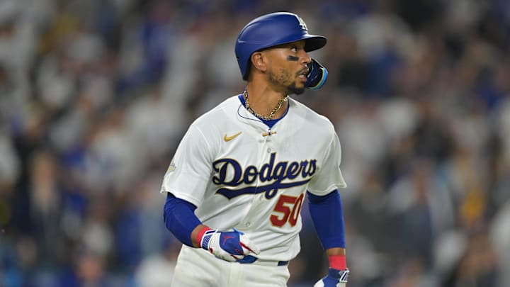 Mar 27, 2026; Los Angeles, California, USA; Los Angeles Dodgers shortstop Mookie Betts (50) runs after hitting a three run home run against the Arizona Diamondbacks in the third inning at Dodger Stadium. Mandatory Credit: Jayne Kamin-Oncea-Imagn Images