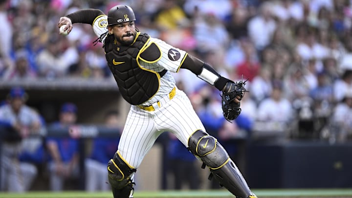 Aug 22, 2024; San Diego, California, USA; San Diego Padres catcher Luis Campusano (12) throws to first base during the second inning against the New York Mets at Petco Park. Mandatory Credit: Orlando Ramirez-Imagn Images