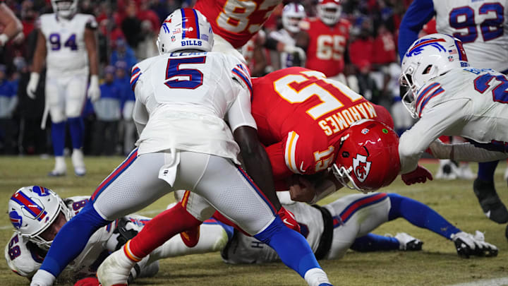 Jan 26, 2025; Kansas City, MO, USA; Kansas City Chiefs quarterback Patrick Mahomes (15) dives for a touchdown against Buffalo Bills cornerback Kaiir Elam (5) during the second half in the AFC Championship game at GEHA Field at Arrowhead Stadium. Mandatory Credit: Denny Medley-Imagn Images Jan 26, 2025; Kansas City, MO, USA; Kansas City Chiefs quarterback Patrick Mahomes (15) dives for a touchdown against Buffalo Bills cornerback Kaiir Elam (5) during the second half in the AFC Championship game at GEHA Field at Arrowhead Stadium. Mandatory Credit: Denny Medley-Imagn Images