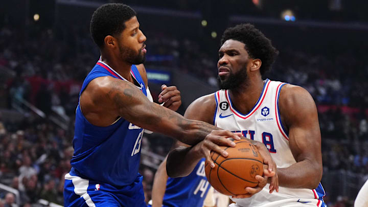 Jan 17, 2023; Los Angeles, California, USA; Philadelphia 76ers center Joel Embiid (21) is fouled by LA Clippers guard Paul George (13) in the first half at Crypto.com Arena. Mandatory Credit: Kirby Lee-Imagn Images Jan 17, 2023; Los Angeles, California, USA; Philadelphia 76ers center Joel Embiid (21) is fouled by LA Clippers guard Paul George (13) in the first half at Crypto.com Arena. Mandatory Credit: Kirby Lee-Imagn Images