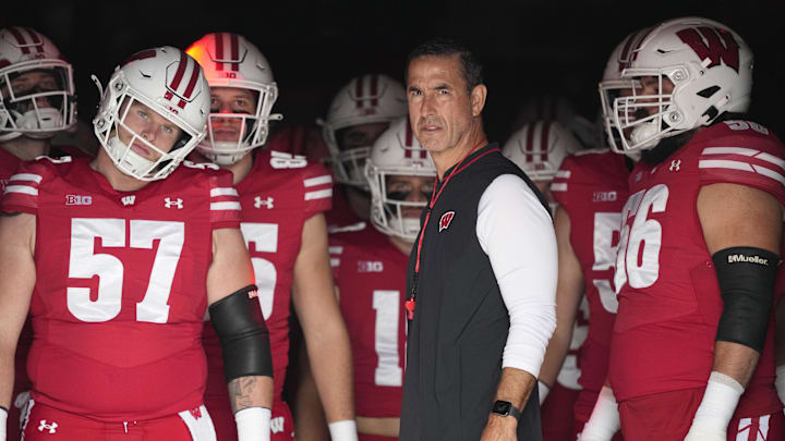 Oct 18, 2025; Madison, Wisconsin, USA;  Wisconsin Badgers head coach Luke Fickell during warmups prior to the game against the Ohio State Buckeyes at Camp Randall Stadium. 