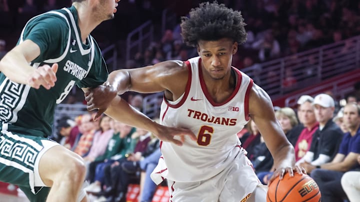 Feb 1, 2025; Los Angeles, California, USA;  USC Trojans guard Wesley Yates III (6) attempts to drive on the sideline against the Michigan State Spartans during the first half at Galen Center. Mandatory Credit: William Navarro-Imagn Images