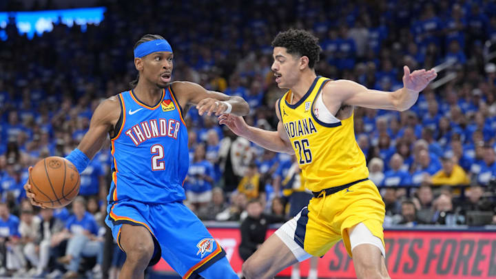 Jun 8, 2025; Oklahoma City, Oklahoma, USA; Oklahoma City Thunder guard Shai Gilgeous-Alexander (2) dribbles the ball against Indiana Pacers guard Ben Sheppard (26) during the second half during game two of the 2025 NBA Finals at Paycom Center. Mandatory Credit: Kyle Terada-Imagn Images Jun 8, 2025; Oklahoma City, Oklahoma, USA; Oklahoma City Thunder guard Shai Gilgeous-Alexander (2) dribbles the ball against Indiana Pacers guard Ben Sheppard (26) during the second half during game two of the 2025 NBA Finals at Paycom Center. Mandatory Credit: Kyle Terada-Imagn Images