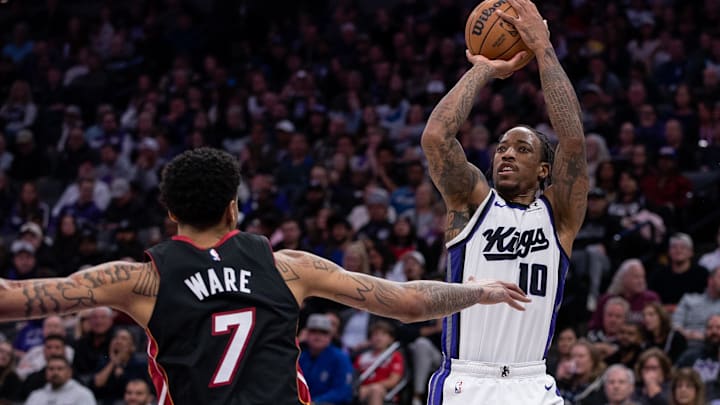Jan 6, 2025; Sacramento, California, USA; Sacramento Kings forward DeMar DeRozan (10) takes a jump shot during the third quarter against the Miami Heat at Golden 1 Center. Mandatory Credit: Ed Szczepanski-Imagn Images