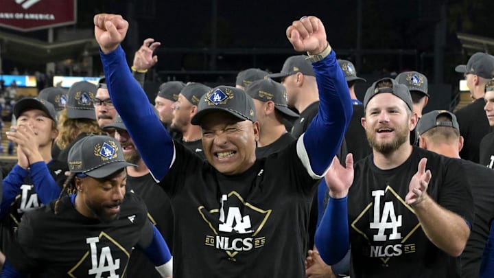 Oct 9, 2025; Los Angeles, California, USA; Los Angeles Dodgers manager Dave Roberts (30) celebrates after defeating the Philadelphia Phillies in game four of the NLDS during the 2025 MLB playoffs at Dodger Stadium. Mandatory Credit: Jayne Kamin-Oncea-Imagn Images
