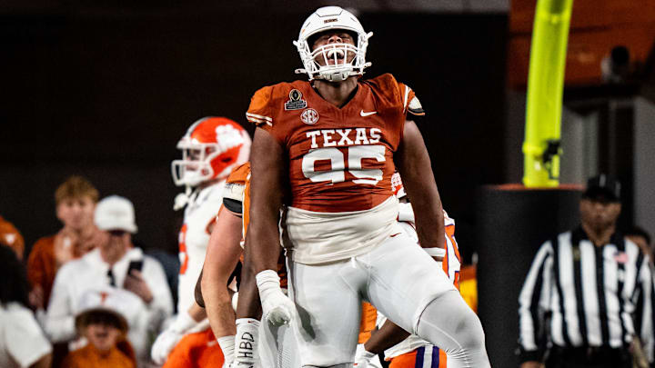 Texas Longhorns defensive lineman Alfred Collins celebrates after a quarterback sack against the Clemson Tigers
