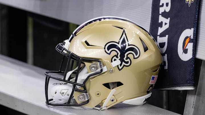 Nov 5, 2023; New Orleans, Louisiana, USA;  Detailed view of the New Orleans Saints helmet on the team bench against the Chicago Bears during the first half at the Caesars Superdome. Mandatory Credit: Stephen Lew-Imagn Images