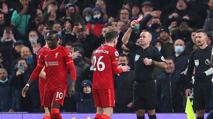 Robertson scored for Liverpool but was then dismissed Robertson scored for Liverpool but was then dismissed