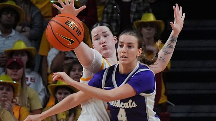 Iowa State Cyclones' forward Addy Brown (24) defends as Kansas State Wildcats guard Serena Sundell (4) passes the ball during the fourth quarter in the Big-12 women’s basketball at Hilton Coliseum on Sunday, March 2, 2025, in Ames, Iowa.