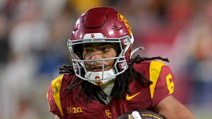 Oct 11, 2025; Los Angeles, California, USA; USC Trojans wide receiver Makai Lemon (6) takes the ball on a kickoff return in the second half against the Michigan Wolverines at United Airlines Field at the Los Angeles Memorial Coliseum. 