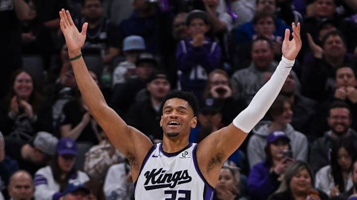 Jan 21, 2026; Sacramento, California, USA; Sacramento Kings center Dylan Cardwell (32) celebrates after drawing a foul against the Toronto Raptors during the third quarter at Golden 1 Center. Mandatory Credit: Ed Szczepanski-Imagn Images