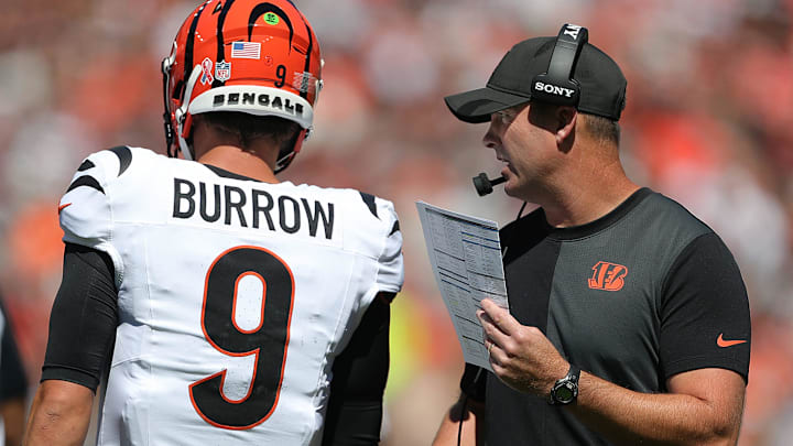 Cincinnati Bengals head coach Zac Taylor, right, has a word with quarterback Joe Burrow (9) during the first half of an NFL football game at Huntington Bank Field, Sept. 7, 2025, in Cleveland, Ohio. Cincinnati Bengals head coach Zac Taylor, right, has a word with quarterback Joe Burrow (9) during the first half of an NFL football game at Huntington Bank Field, Sept. 7, 2025, in Cleveland, Ohio.