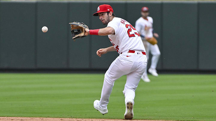 Sep 12, 2024; St. Louis, Missouri, USA;  St. Louis Cardinals second baseman Thomas Saggese (25) fields a ground ball against the Cincinnati Reds during the ninth inning at Busch Stadium. Mandatory Credit: Jeff Curry-Imagn Images