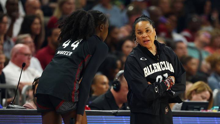 Apr 5, 2026; Phoenix, AZ, USA; South Carolina Gamecocks head coach Dawn Staley with guard Agot Makeer (44) against the UCLA Bruins during the National Championship game of the women's 2026 NCAA Tournament at Mortgage Matchup Center. Mandatory Credit: Mark J. Rebilas-Imagn Images