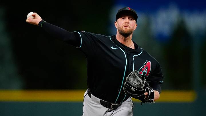 Sep 23, 2026; Denver, Colorado, USA; Arizona Diamondbacks starting pitcher Merrill Kelly (29) delivers a pitch in the first inning against the Colorado Rockies at Coors Field. Mandatory Credit: Ron Chenoy-Imagn Images Sep 23, 2026; Denver, Colorado, USA; Arizona Diamondbacks starting pitcher Merrill Kelly (29) delivers a pitch in the first inning against the Colorado Rockies at Coors Field. Mandatory Credit: Ron Chenoy-Imagn Images