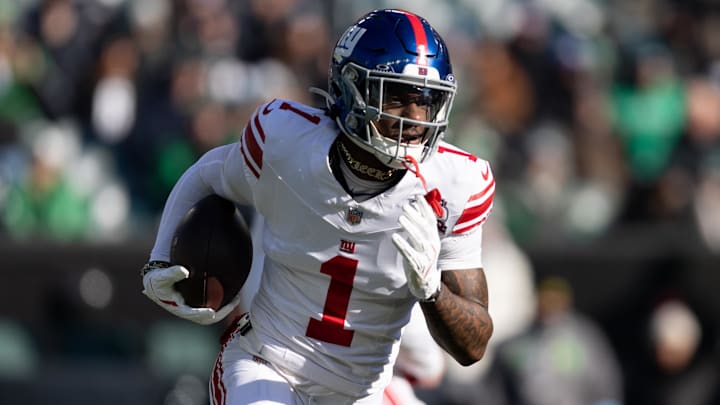 Jan 5, 2025; Philadelphia, Pennsylvania, USA; New York Giants wide receiver Malik Nabers (1) runs with the ball against the Philadelphia Eagles during the first quarter at Lincoln Financial Field. Mandatory Credit: Bill Streicher-Imagn Images