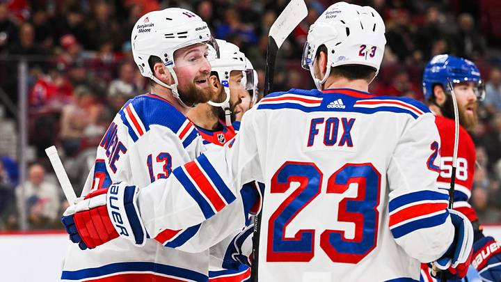 Mar 9, 2023; Montreal, Quebec, CAN; New York Rangers left wing Alexis Lafreniere (13) celebrates his goal against the Montreal Canadiens with defenseman Adam Fox (23)  during the first period at Bell Centre. Mandatory Credit: David Kirouac-Imagn Images