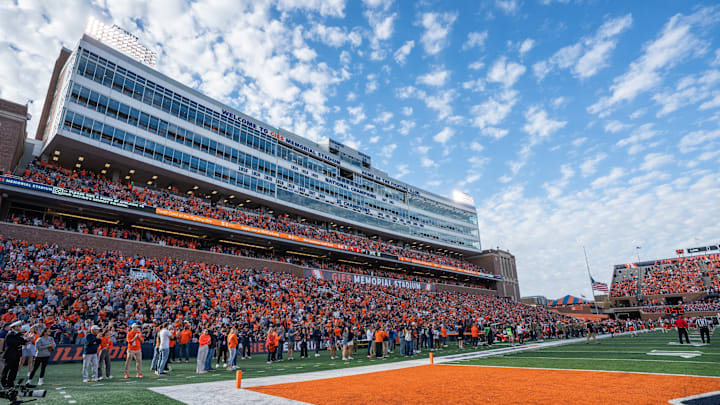 The crowd at Illinois' Gies Memorial Stadium rises in honor of Military Appreciation Day before the Illini's win over Maryland on Nov. 1 in Champaign, Illinois. The crowd at Illinois' Gies Memorial Stadium rises in honor of Military Appreciation Day before the Illini's win over Maryland on Nov. 1 in Champaign, Illinois.