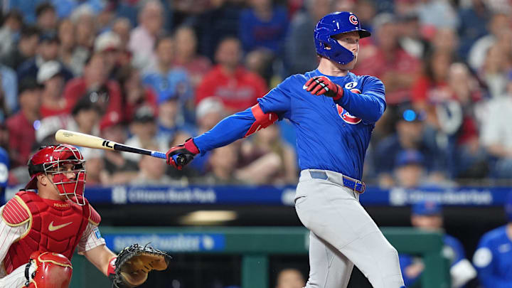 Jun 9, 2025; Philadelphia, Pennsylvania, USA; Chicago Cubs outfielder Pete Crow-Armstrong (4) hits an RBI double against the Philadelphia Phillies in the eleventh inning at Citizens Bank Park. 
