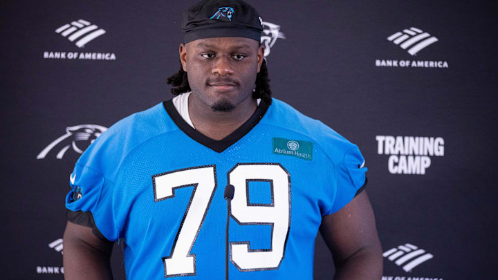 Jul 24, 2025; Charlotte, NC, USA; Carolina Panthers offensive tackle Ikem Ekwonu (79) talks with the media after practice during training camp.