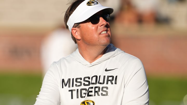 Missouri Tigers head coach Eliah Drinkwitz looks to the scoreboard during a game versus the Central Arkansas Bears this season. Missouri Tigers head coach Eliah Drinkwitz looks to the scoreboard during a game versus the Central Arkansas Bears this season.