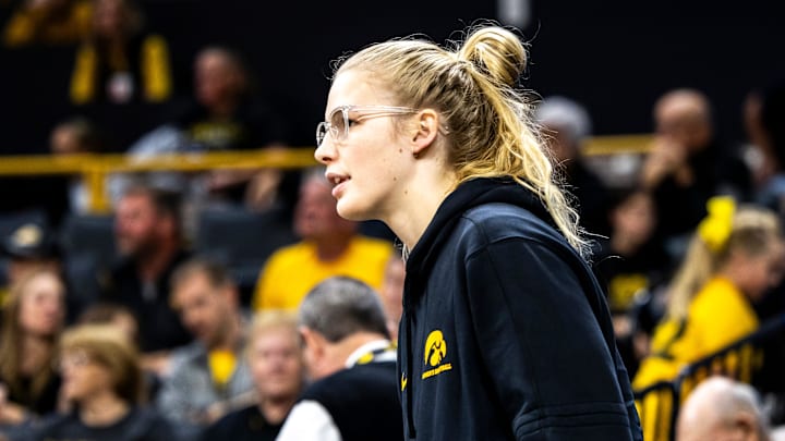 Iowa forward Ava Jones watches during a NCAA women's basketball exhibition game between Iowa and Clarke University, Sunday, Oct. 22, 2023, at Carver-Hawkeye Arena in Iowa City. Iowa forward Ava Jones watches during a NCAA women's basketball exhibition game between Iowa and Clarke University, Sunday, Oct. 22, 2023, at Carver-Hawkeye Arena in Iowa City.