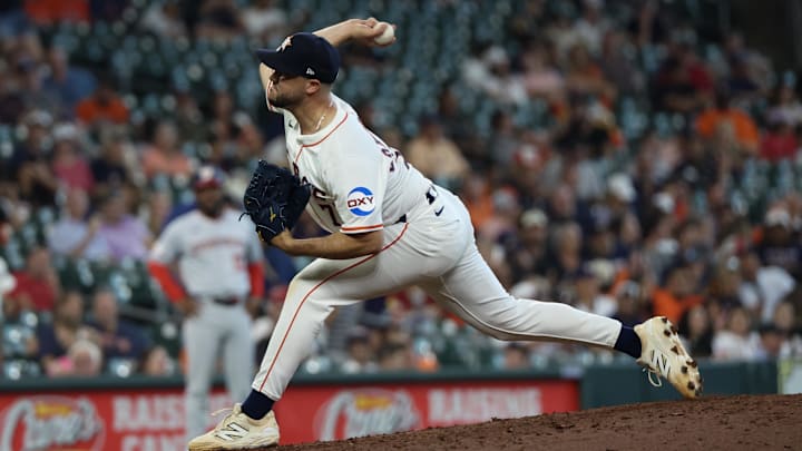 Jul 30, 2025; Houston, Texas, USA;  Houston Astros relief pitcher Luis Contreras (73) pitches against the Washington Nationals in the ninth inning at Daikin Park.
