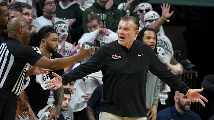 Feb 7, 2026; East Lansing, Michigan, USA;  Illinois Fighting Illini head coach Brad Underwood protests a call during the first half against the Michigan State Spartans at Jack Breslin Student Events Center. Mandatory Credit: Dale Young-Imagn Images