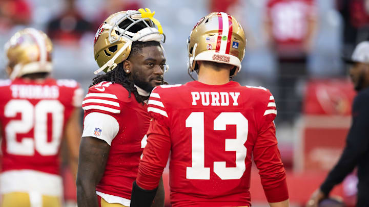 Dec 17, 2023; Glendale, Arizona, USA; San Francisco 49ers quarterback Brock Purdy (13) with wide receiver Brandon Aiyuk (11) against the Arizona Cardinals at State Farm Stadium. Mandatory Credit: Mark J. Rebilas-USA TODAY Sports Dec 17, 2023; Glendale, Arizona, USA; San Francisco 49ers quarterback Brock Purdy (13) with wide receiver Brandon Aiyuk (11) against the Arizona Cardinals at State Farm Stadium. Mandatory Credit: Mark J. Rebilas-USA TODAY Sports