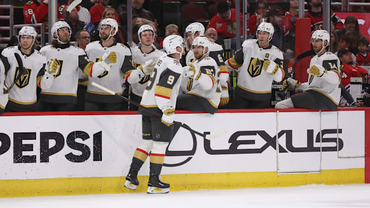 Mar 28, 2025; Chicago, Illinois, USA; Vegas Golden Knights center Jack Eichel (9) high-fives teammates after a second period Vegas Golden Knights goal against the Chicago Blackhawks at United Center. Mandatory Credit: Talia Sprague-Imagn Images
