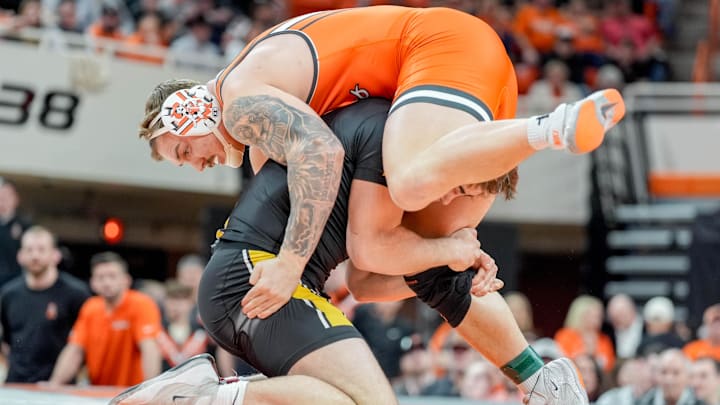 Missouri’s Jarrett Stoner attempts to take down Oklahoma State’s Wyatt Hendrickson during an NCAA wrestling meet between Oklahoma State and Missouri at Gallagher-Iba Arena in Stillwater, Okla., on Sunday, Feb. 2, 2025.