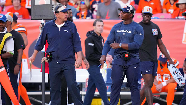 Oct 8, 2023; Denver, Colorado, USA; Denver Broncos head coach Sean Peyton interacts with defensive coordinator Vance Joseph in fourth quarter against the New York Jets at Empower Field at Mile High. Mandatory Credit: Ron Chenoy-Imagn Images